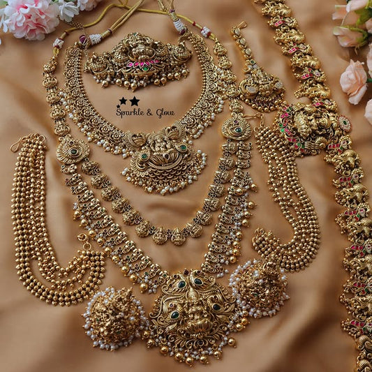Jadau lakshmi Peacock carved Bridal Set
